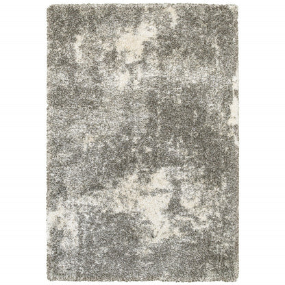 5' X 8' Gray And Ivory Distressed Abstract Area Rug