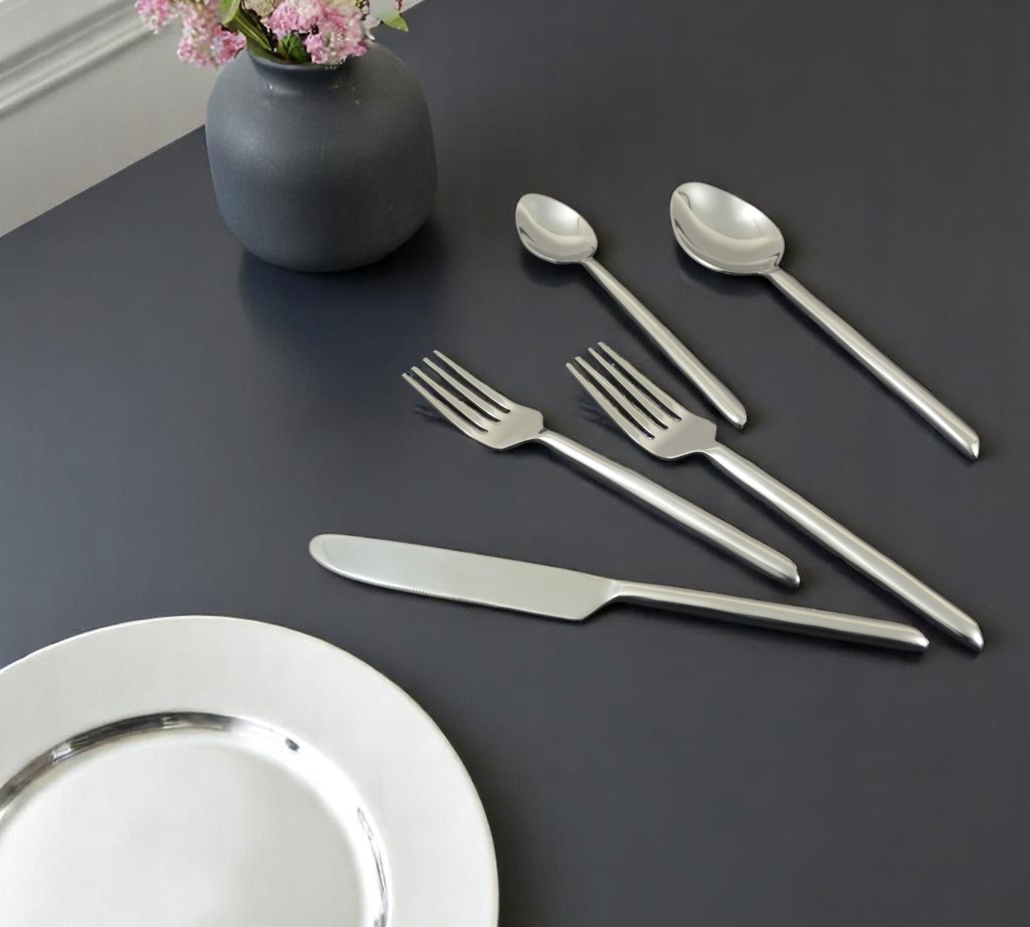 Glossy Silver Stainless Steel Twenty Piece Hand Forged Flatware Set