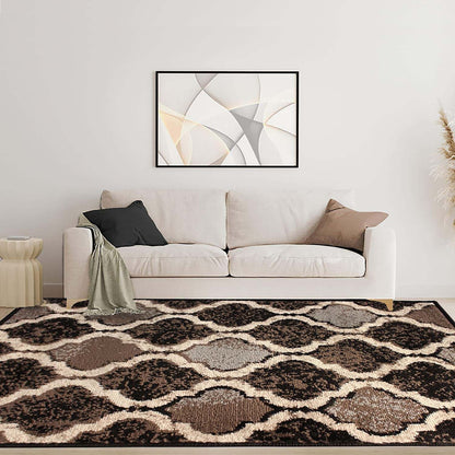 5' X 8' Brown Black And Ivory Quatrefoil Distressed Area Rug
