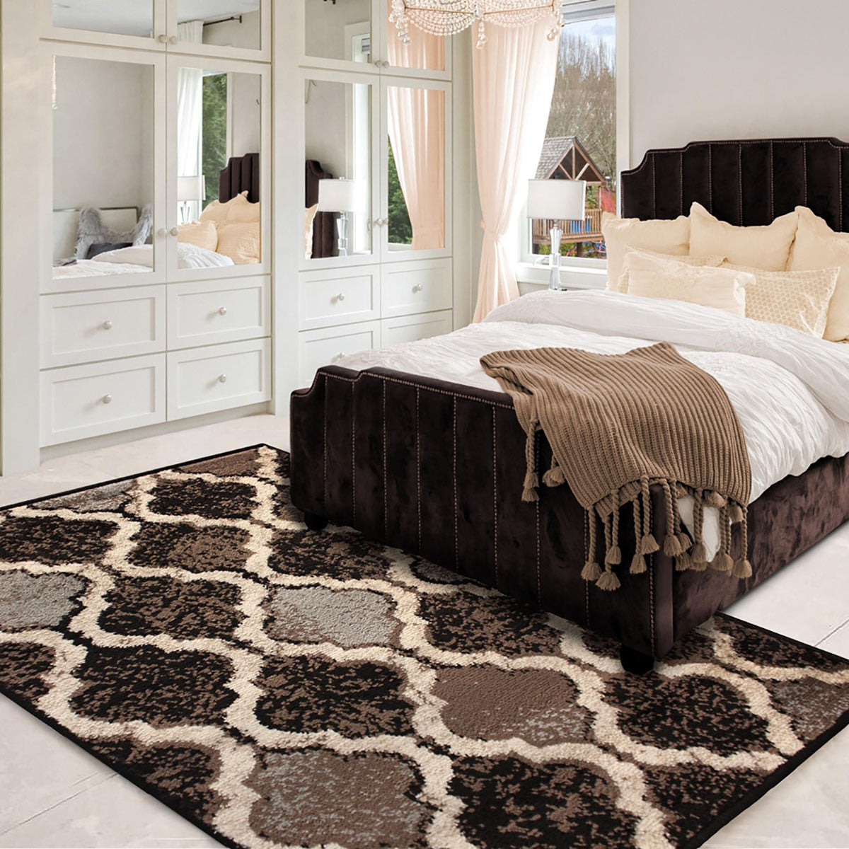 5' X 8' Brown Black And Ivory Quatrefoil Distressed Area Rug